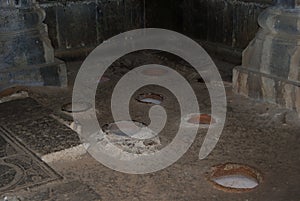 Scriptorium, Haghpat. Holes in floor for hiding scrolls during times of peril