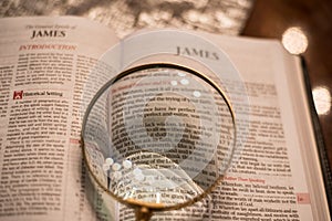 Scripture with magnifying glass james chapter 1