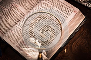 Scripture with magnifying glass romans chapter 8