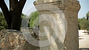 Scriptures on a rock in the Ancient Agora of Athens