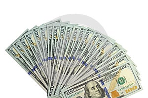 Scrolled stack of 100 dollar bills isolated on white background