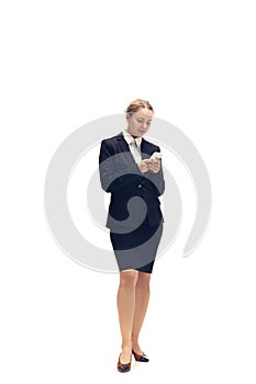 Young woman, accountant, booker in office suit isolated on white studio background photo