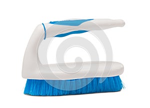 Scrub Brush Used for Cleaning with a White Handle and Blue Bristles on a White Background
