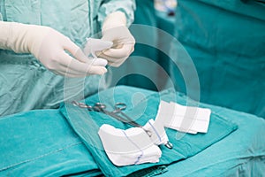 Scrub nurse praparing instruments for open heart operation