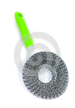 Scrubbrush with green handle isolated on white