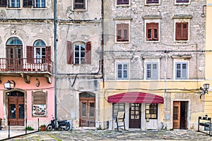 Scruffy facade of an old houses in Pula, Croatia.