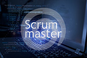 Scrum master inscription against laptop and code background. Scrum is facilitated by a scrum master