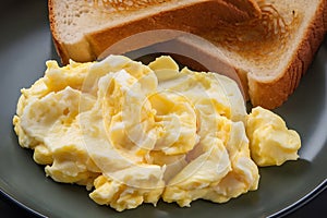 Scrumptious Scrambled Eggs Served with Toasted Bread