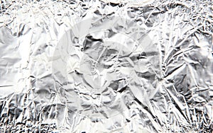 Scrunched shiny aluminium foil surface