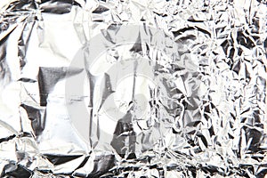 Scrunched shiny aluminum foil surface