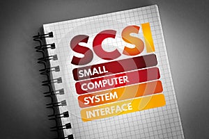SCSI - Small Computer System Interface acronym on notepad, technology concept background