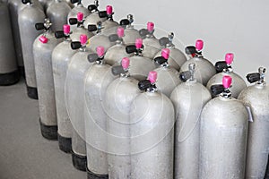 Scuba cylinders with red caps