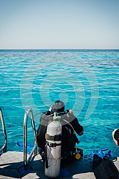 Scuba diver before diving. A diving lesson in open water.