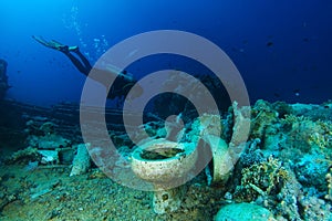 Scuba diver explore Yolanda reef