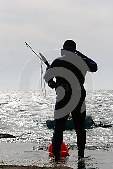 Scuba diver fisherman