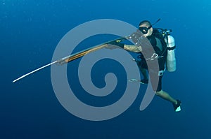 Scuba diver with Harpoon gun