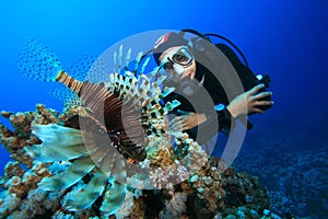 Scuba Diver and Lionfish photo