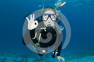 Scuba diver makes OK sign