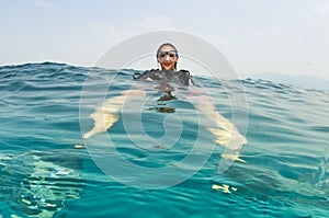 Scuba diver on surface before dive