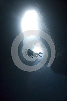 SCUBA Diver in underwater cavern