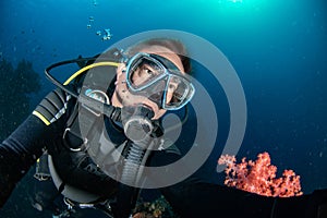 Scuba diver underwater portrait in the ocean