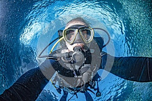 Scuba diver underwater selfie portrait in the ocean