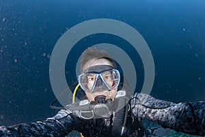 Scuba diver underwater selfie portrait in the ocean