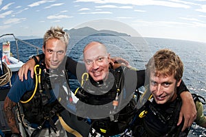 Scuba divers on boat befor dive