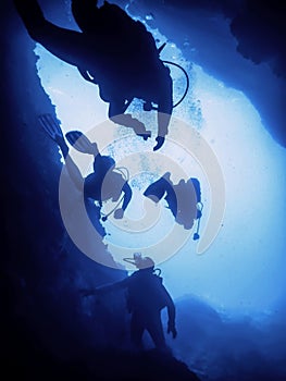 Scuba Divers Silhouette Underwater Cave