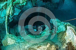 Scuba diving in the Cenote Dos Ojos, Mexico photo