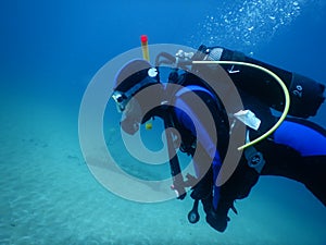 Scuba diving in the clear waters of the  Mediterranean Sea