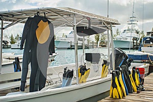 Scuba Gear and Boat at the Dock