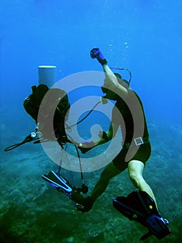 Scuba stunts bcd removal underwater