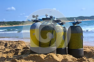 Scuba tanks on beach photo