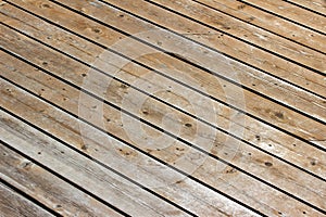 Scuffed up cedar deck floor texture background