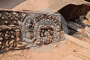 sculpted lintel in a ruined Khmer Hindu temple complex (vat phou or vat phu) - laos photo