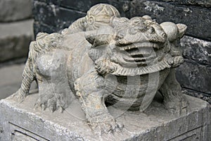 sculpted mythological animal in a mansion in pingyao in china