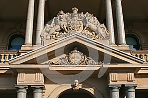 Sculpted and ornate entry portal pediment on historic Custom House, Circular Quay, Sydney CBD, NSW, Australia