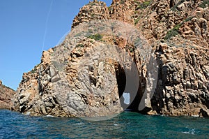 Sculpted rock with a gap in the Gulf of Porto