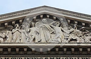 The sculpted tympanum of the `La Madeleine` church, Paris