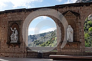 Sculptur wall at Montserrat monastery near Barcelona in Spain photo