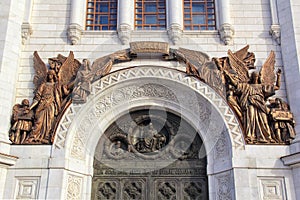 Sculptural composition over the arch of the gate of the western facade in the Cathedral of Christ the Savior in Moscow, Russia.