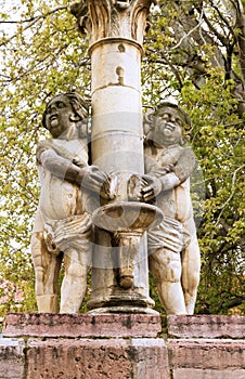 Sculptural figures of children in stone