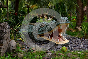 sculpture of an alligator on the island of entertainment.