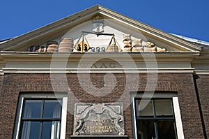 Sculpture on ancient Weigh House in Leiden photo