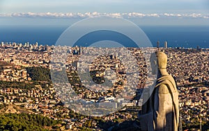 Sculpture of Apostle and view of Barcelona