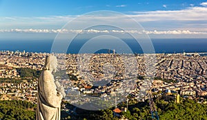 Sculpture of Apostle and view of Barcelona