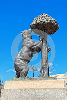 Sculpture of Bear and the Madrono tree in the square Puerta Del