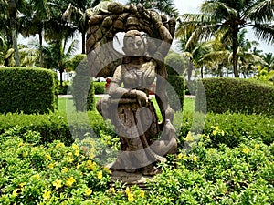 Beautiful Woman Sculpture in garden.