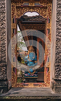Sculpture of blue Lord Ganesha in balinese temple